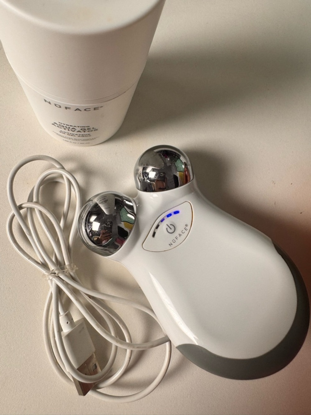 NuFACE Mini microcurrent facial toning device like new + charger + gel